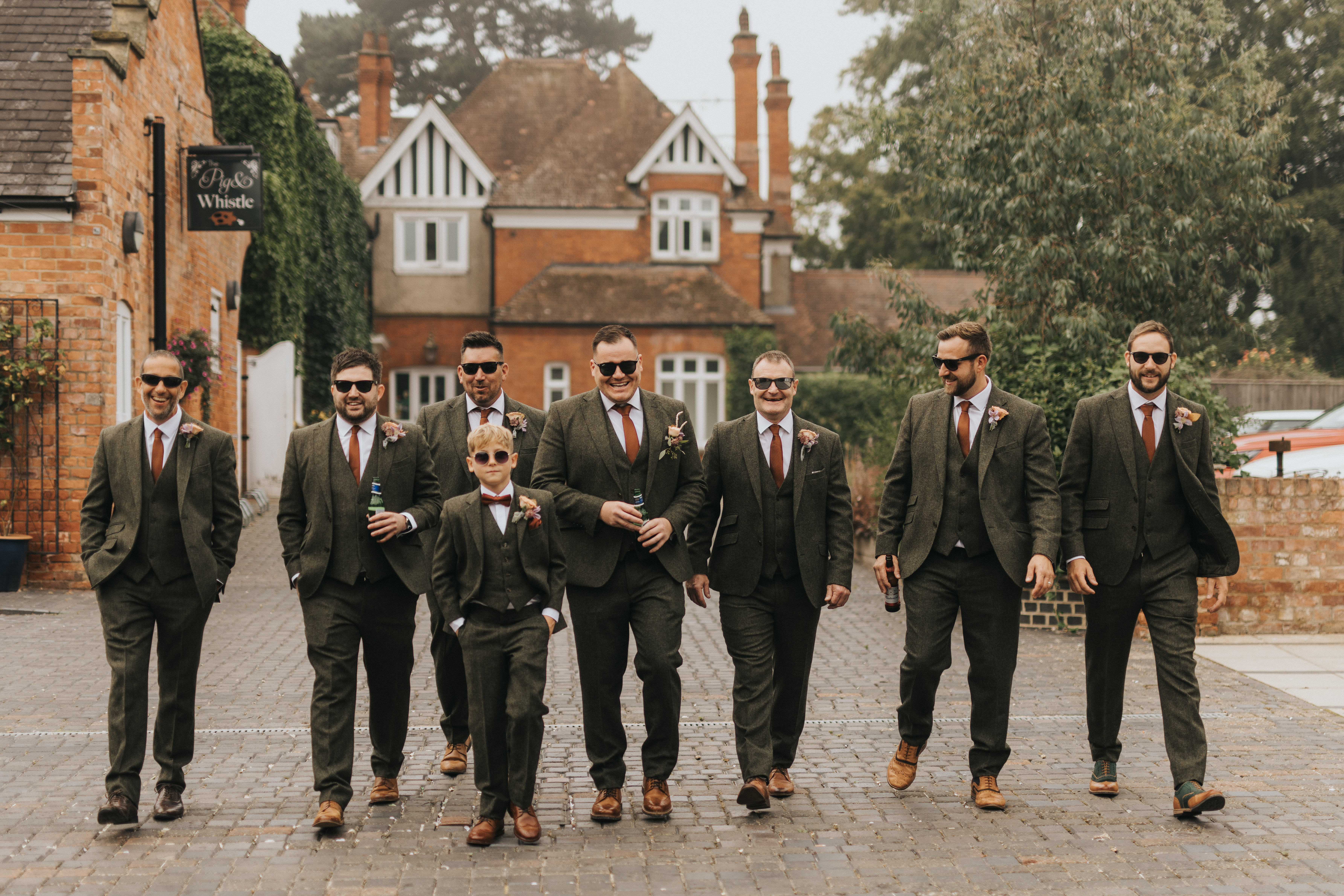 Ashley, the groom, channeled total autumn vibes with his green tweed suit from Fielder Ellis (now closed). He also wore personalised cufflinks with his and Chloe's initials and wedding date on them.
