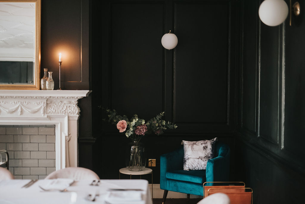 The private dining room at Healing Manor is painted black and set in the main Manor House.
